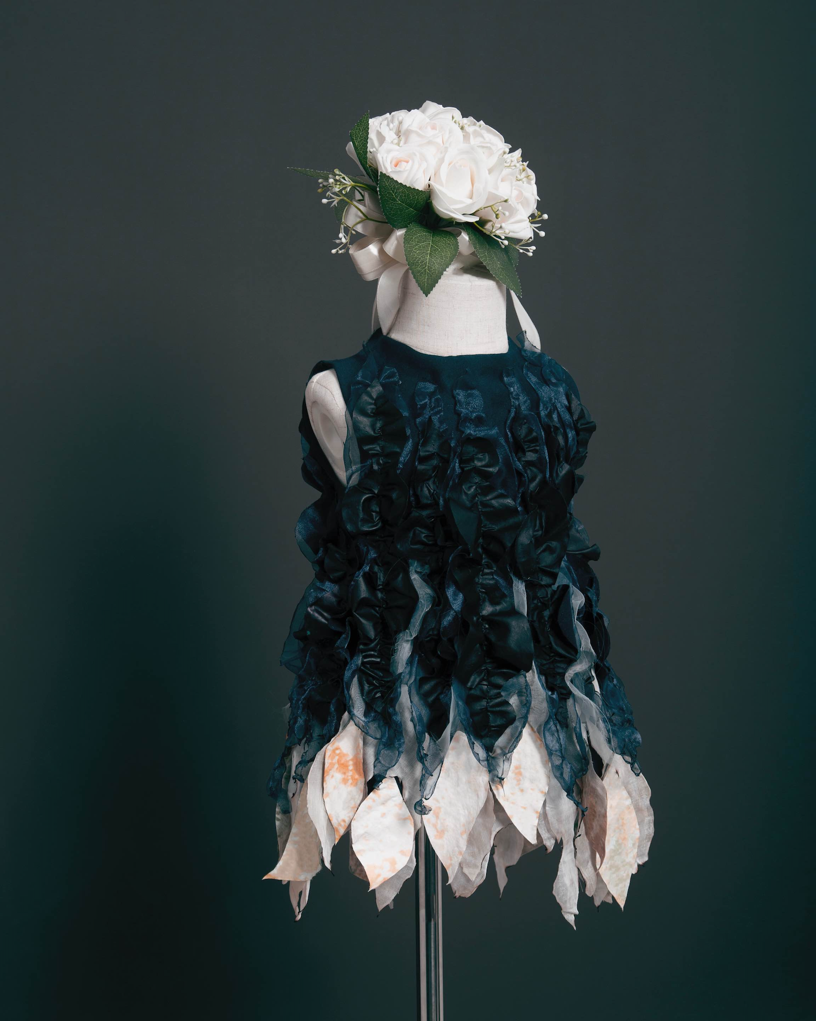 Prototype garment fabricated from self-pigmented fungal textiles. /SIAT