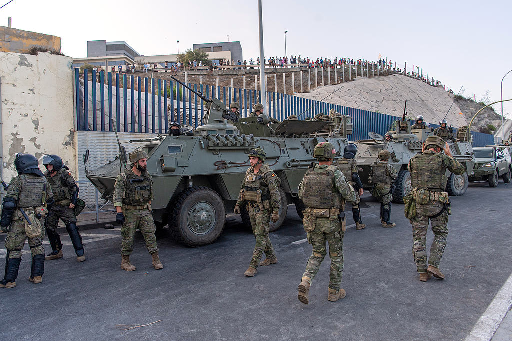 Spain Reinforces Ceuta Border As Migrant Surge Leaves At Least 9 Dead 