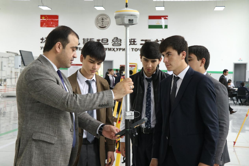 A Tajik teacher instructs students in hands-on equipment training at a Luban Workshop in Dushanbe, Tajikistan, April 17, 2023. /CFP