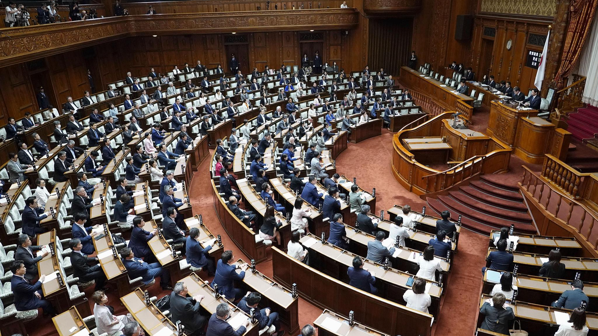 Japan's House of Councilors approves a bill to establish a new national intelligence bureau during a plenary session in Tokyo, May 27, 2026. /CFP