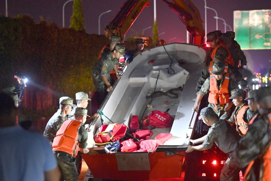 Chinese People's Liberation Army (PLA) soldiers carry out rescue operations in Guigang, Guangxi Zhuang Autonomous Region, July 7, 2026. /Xinhua