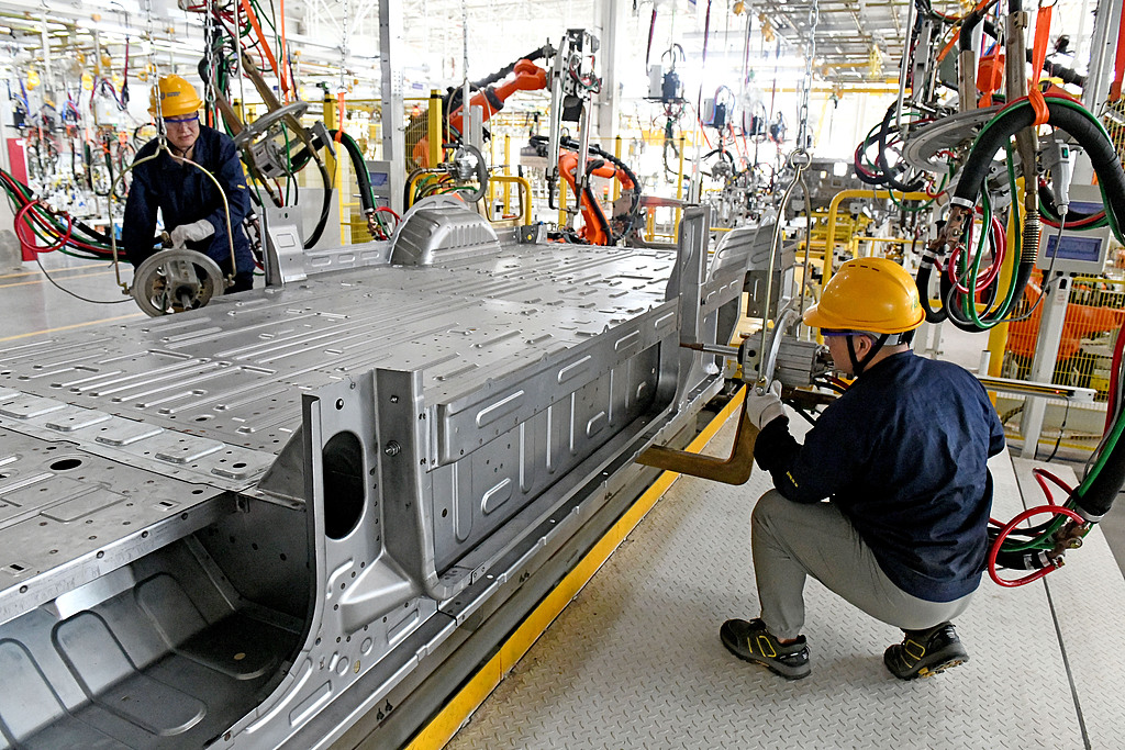 Orderly production in a new energy vehicle manufacturing workshop in Huainan City, Anhui Province, June 24, 2026. /VCG