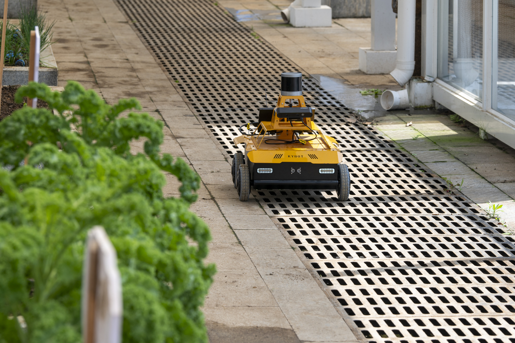 An AI-powered agricultural inspection robot conducting inspections at the Jinhua Smart Agriculture Application Base, Zhejiang Province, China, April 20, 2026. /VCG