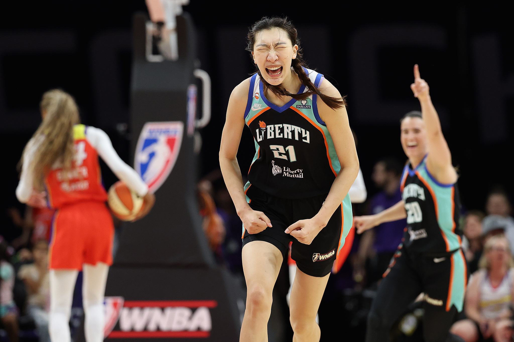 New York Liberty center Han Xu (C) reacts after sinking a three-pointer against the Phoenix Mercury in a WNBA game at Mortgage Matchup Center in Phoenix, Arizona, August 1, 2026. /VCG