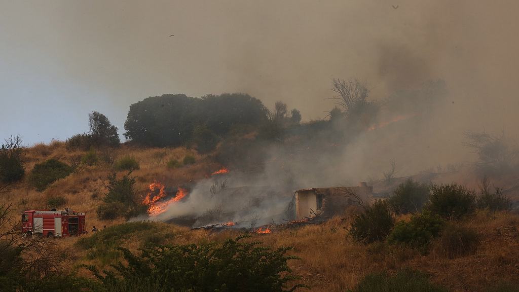 Firefighting helicopter crashes in Greece; wildfires sweep Europe, US