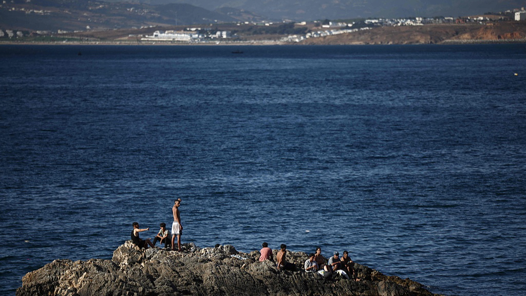 Live: Scenes of migrants and security forces on the beach in Spain's Ceuta