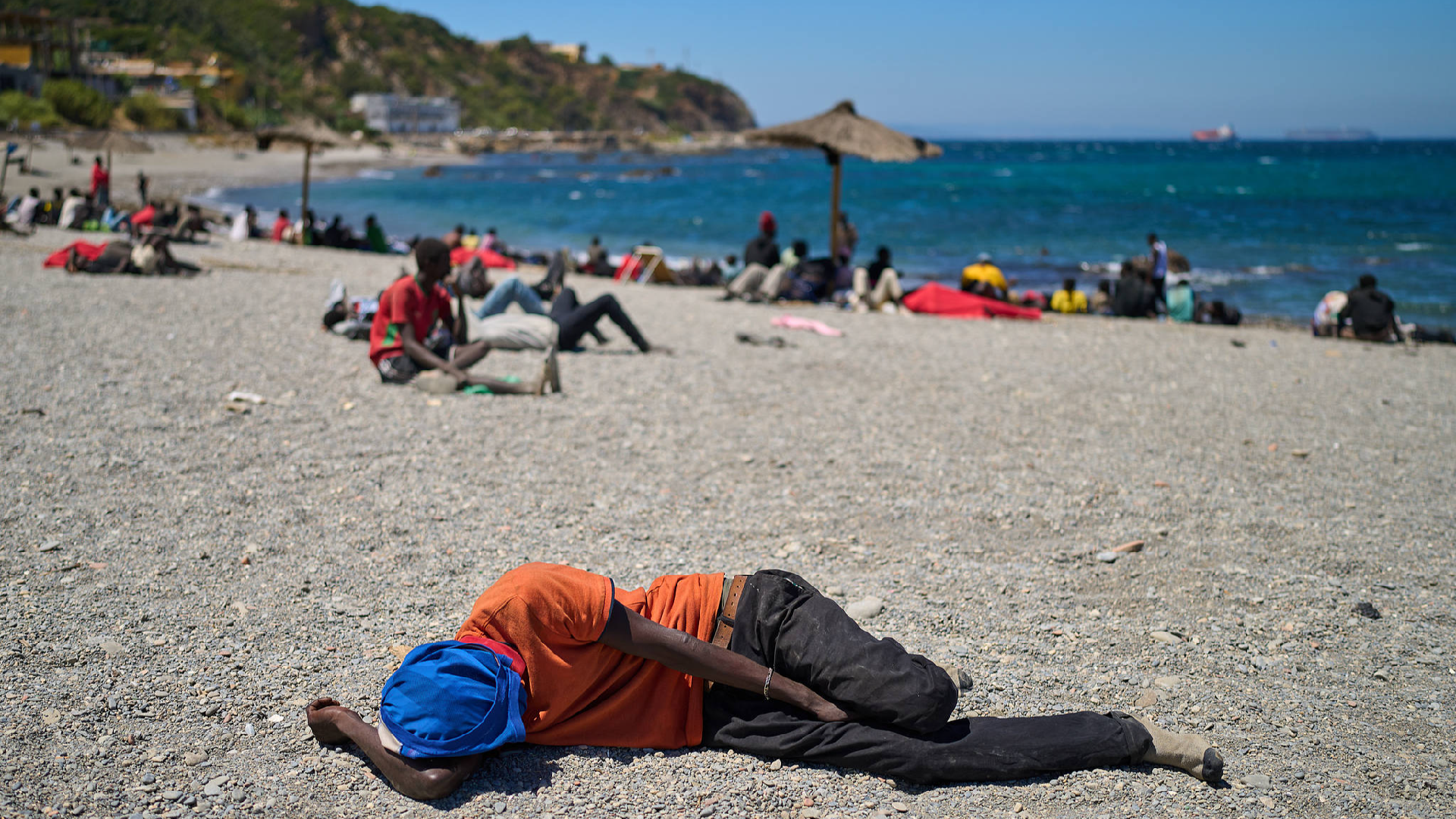 Live: View of migrants and security forces at beach in Spain's Ceuta