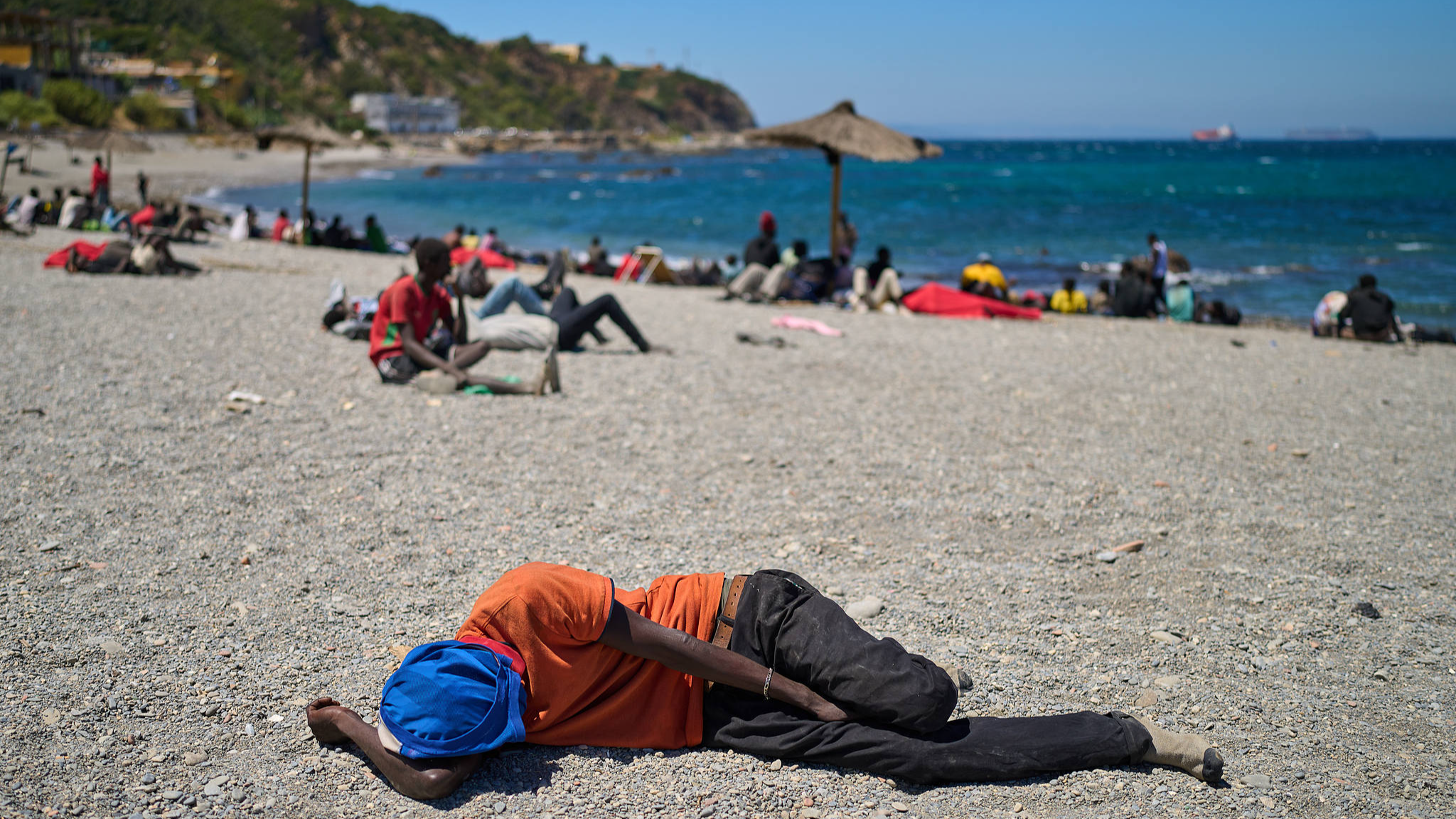 Live: View of migrants and security forces at beach in Spain's Ceuta
