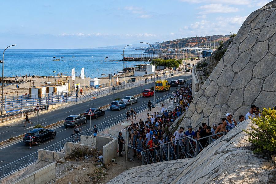 Illegal immigrants enter Spanish enclave Ceuta on July 30, 2026. /Xinhua