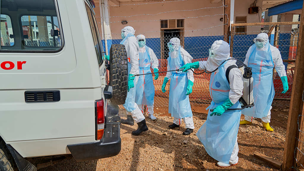 Disinfecting a car at the Ebola treatment center of the General Hospital in Bunia, Ituri province, DRC, July 22, 2026. /VCG