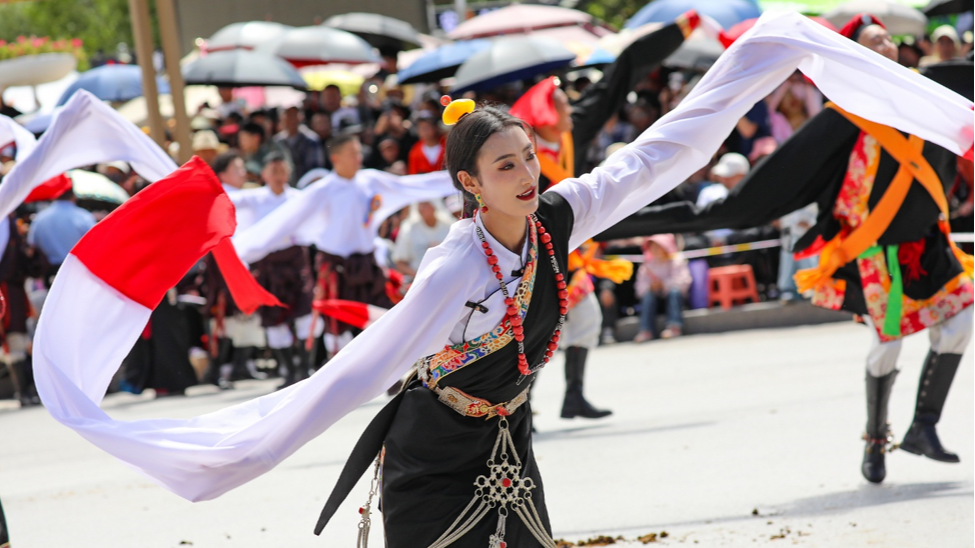 Dancers perform a traditional dance of the Tibetan ethnic community in Yushu Tibetan Autonomous Prefecture, Qinghai Province, northwest China, July 24, 2025. /CFP