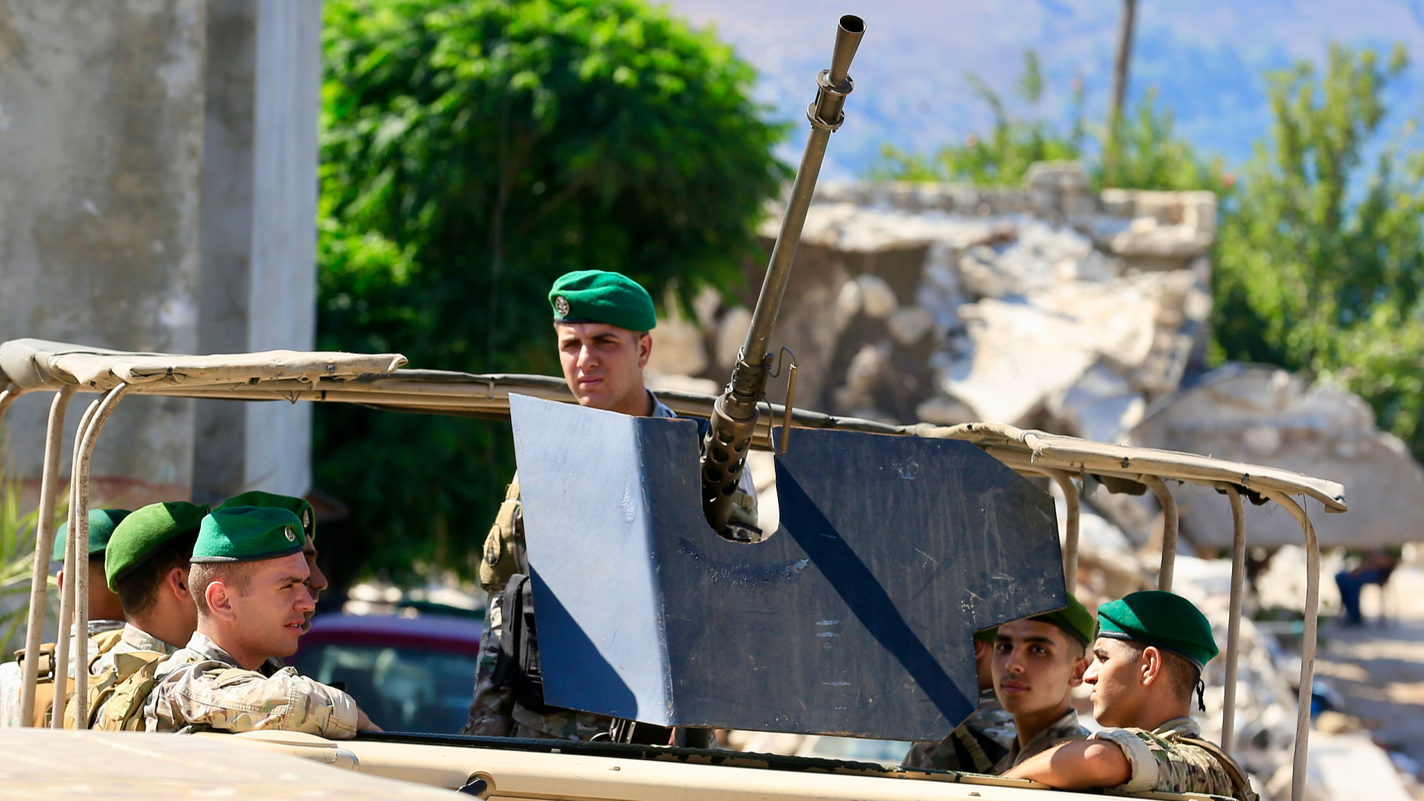 Israel hits S. Lebanon after soldiers killed, talks continue in Rome