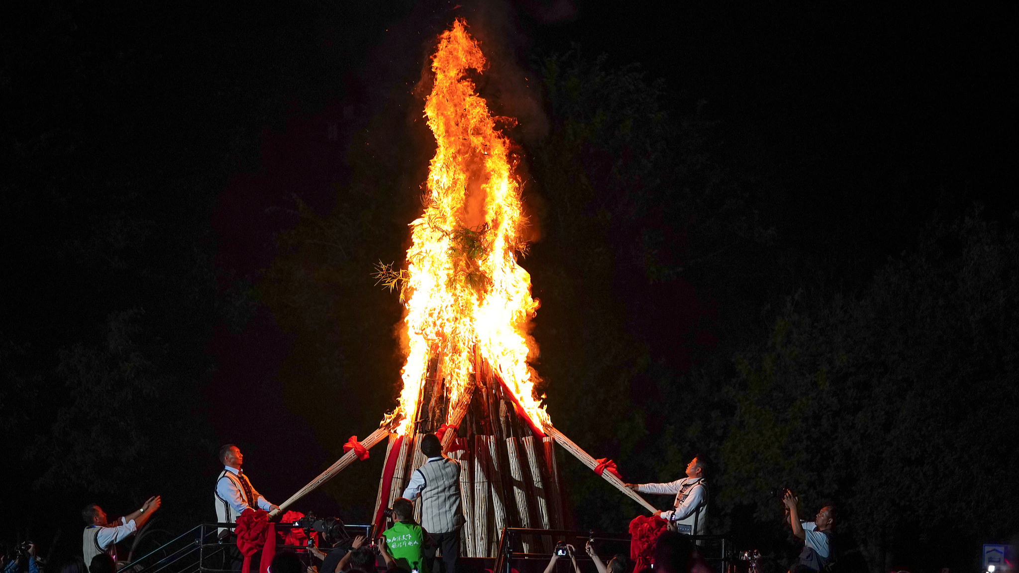 Live: Thousands join in song and dance to celebrate the fiery torch festival in Yunnan