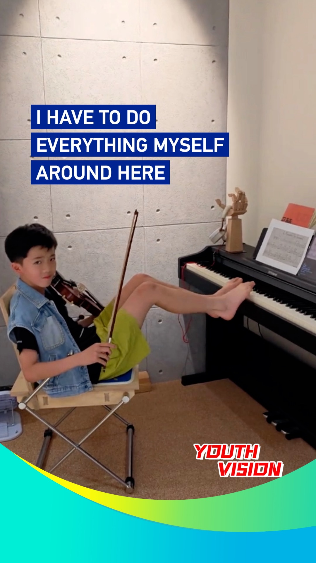 Hands on violin, feet on piano: Young musician wows