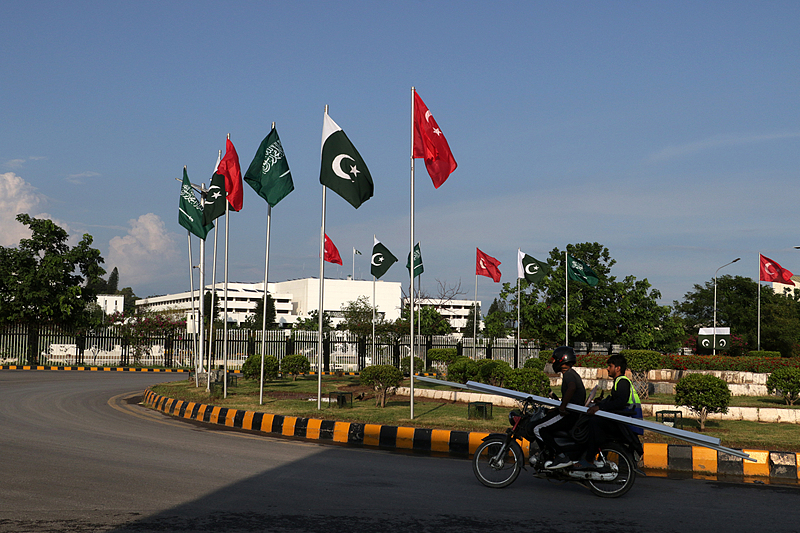 The national flags of Pakistan, Saudi Arabia and Türkiye fly outside the parliament house in Islamabad, Pakistan, August 8, 2026. /CFP