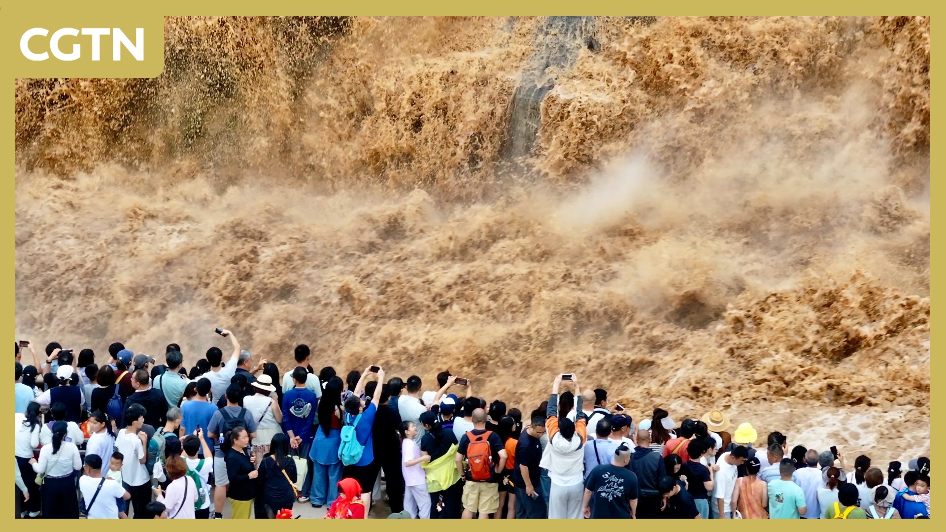 China's 'Yellow Waterfall' draws summer holiday crowds
