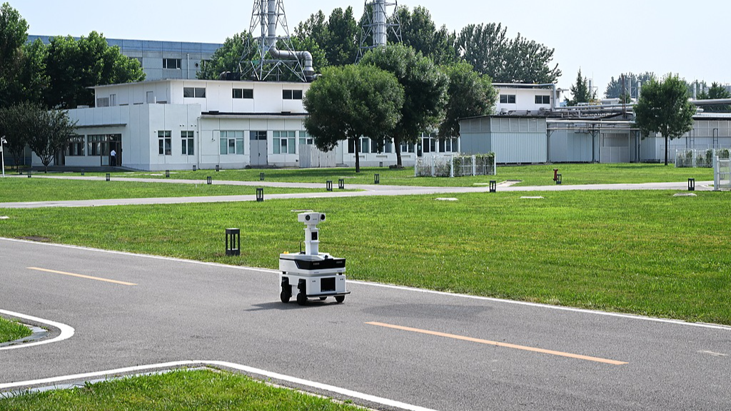 An intelligent robot conducts environmental monitoring at Tongzhou Chemical Industrial Park in Beijing, China, July 24, 2026. /VCG