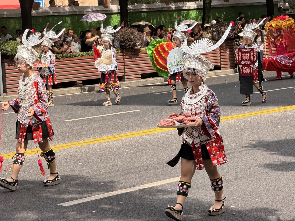 A grand ethnic unity parade is held in Duyun, Guizhou Province to celebrate the 70th anniversary of the establishment of the Qiannan Buyi and Miao Autonomous Prefecture on August 8, 2026. /VCG