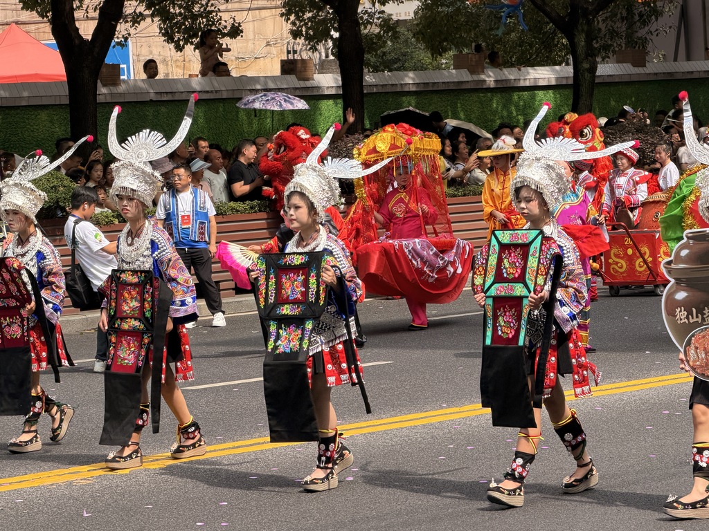 A grand ethnic unity parade is held in Duyun, Guizhou Province to celebrate the 70th anniversary of the establishment of the Qiannan Buyi and Miao Autonomous Prefecture on August 8, 2026. /VCG
