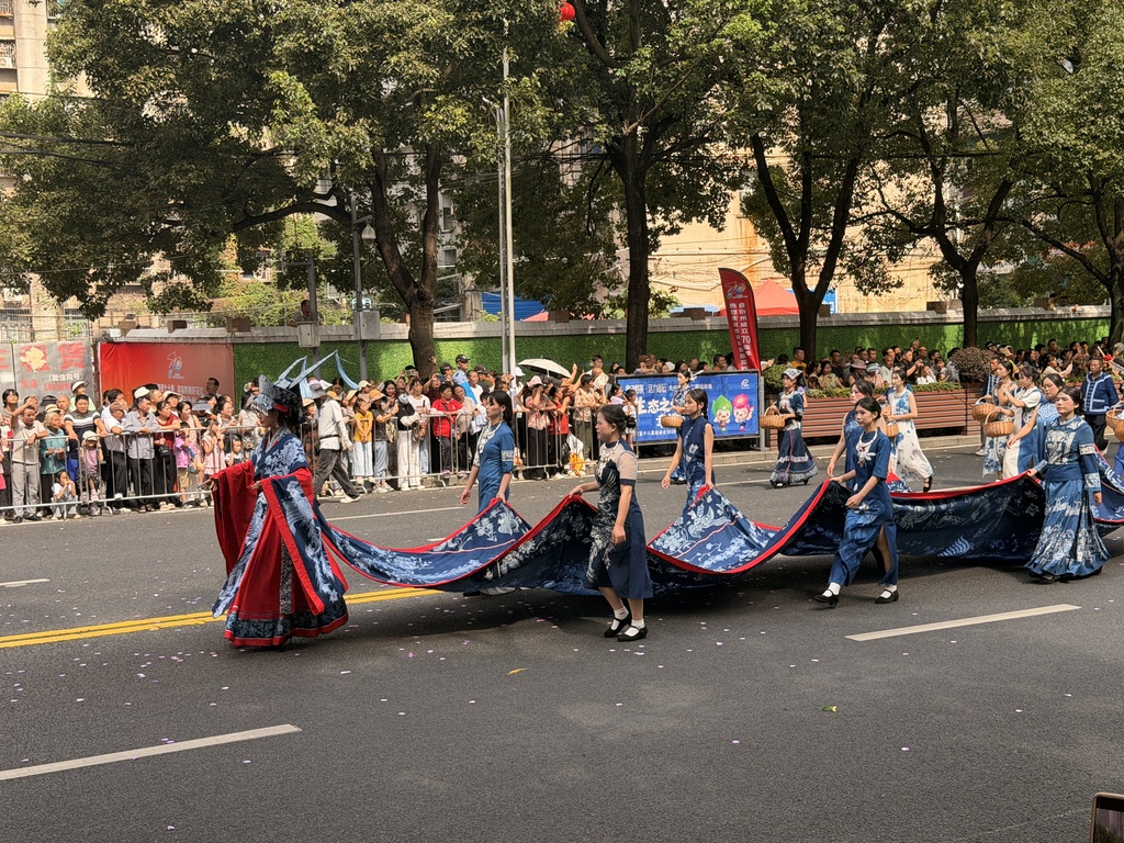 A grand ethnic unity parade is held in Duyun, Guizhou Province to celebrate the 70th anniversary of the establishment of the Qiannan Buyi and Miao Autonomous Prefecture on August 8, 2026. /VCG