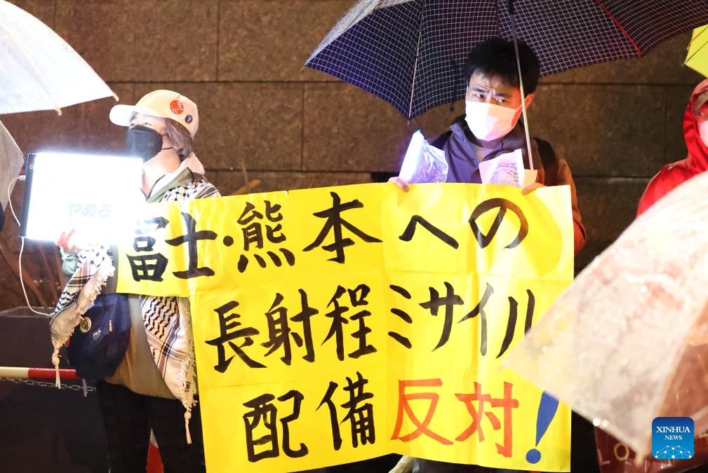 Residents stage a protest against Japanese government's deployment of long-range missiles with counterstrike capabilities, in Tokyo, Japan, on March 31, 2026. /Xinhua