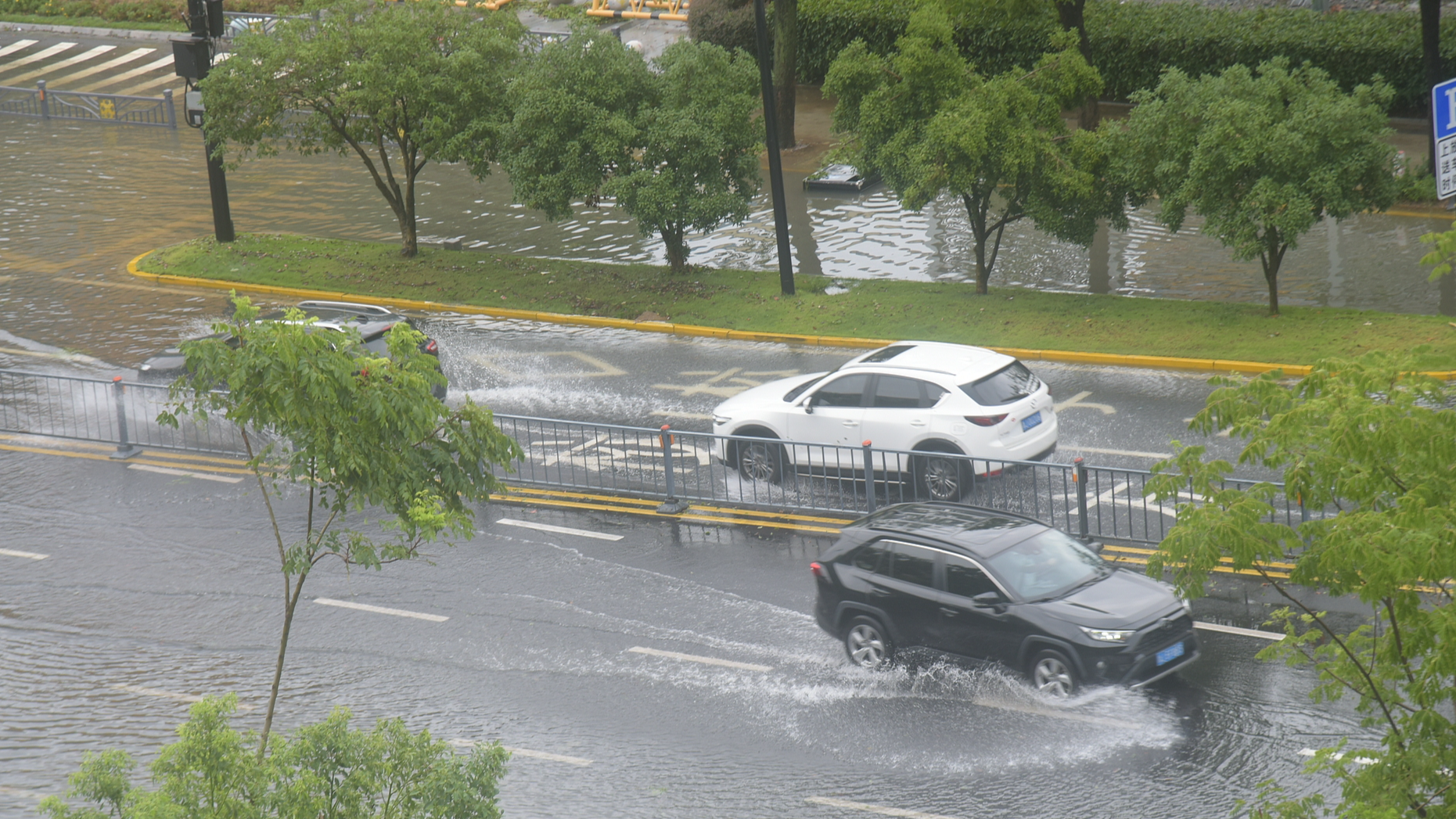 Vehicles travel through flooded streets in Taizhou, Zhejiang Province, east China, August 10, 2026. /VCG
