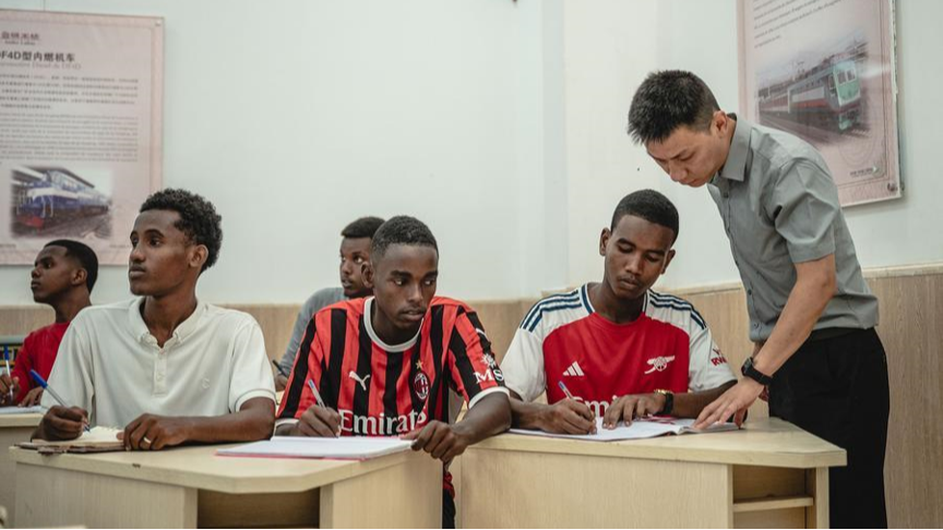 A teacher from the Confucius Institute in Djibouti, teaches students Chinese at the Luban Workshop, a teaching site of the Confucius Institute, in Djibouti City, Djibouti, November 6, 2024. /Xinhua