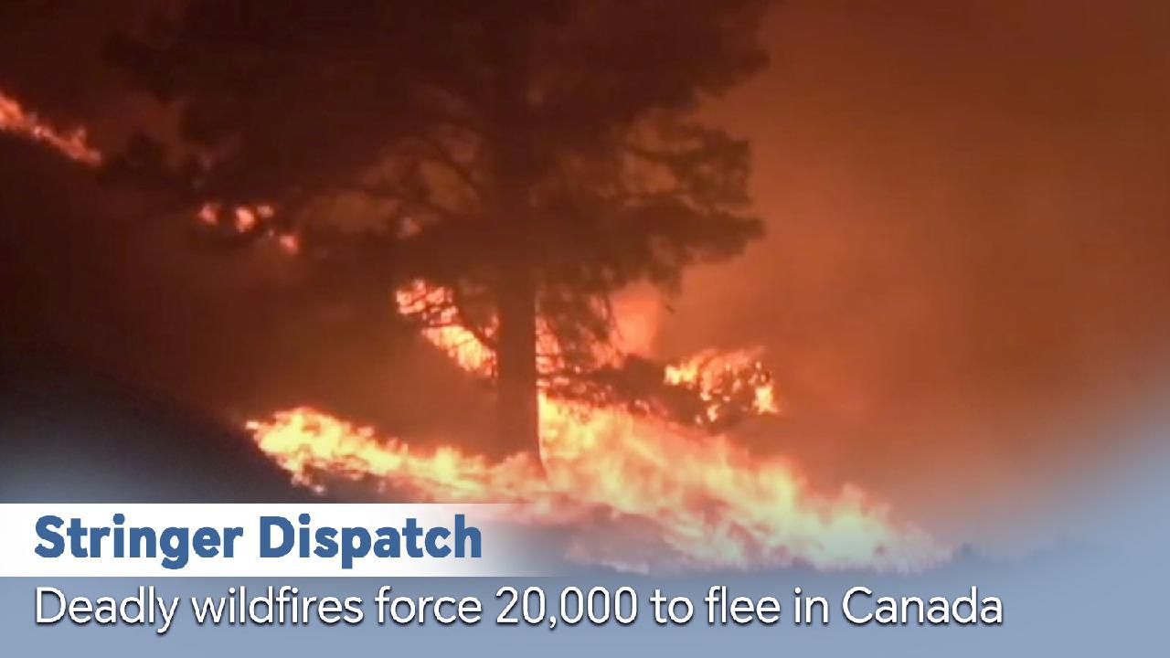 Stringer Dispatch: Deadly wildfires force 20,000 to flee in Canada