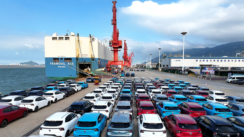 Export-ready vehicles sit awaiting shipment at the Lianyungang port in Lianyungang City, east China's Jiangsu Province, August 4, 2026. /VCG