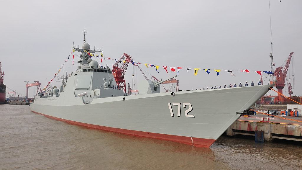 A file photo of the guided-missile destroyer Kunming berthed in a harbor. /VCG 