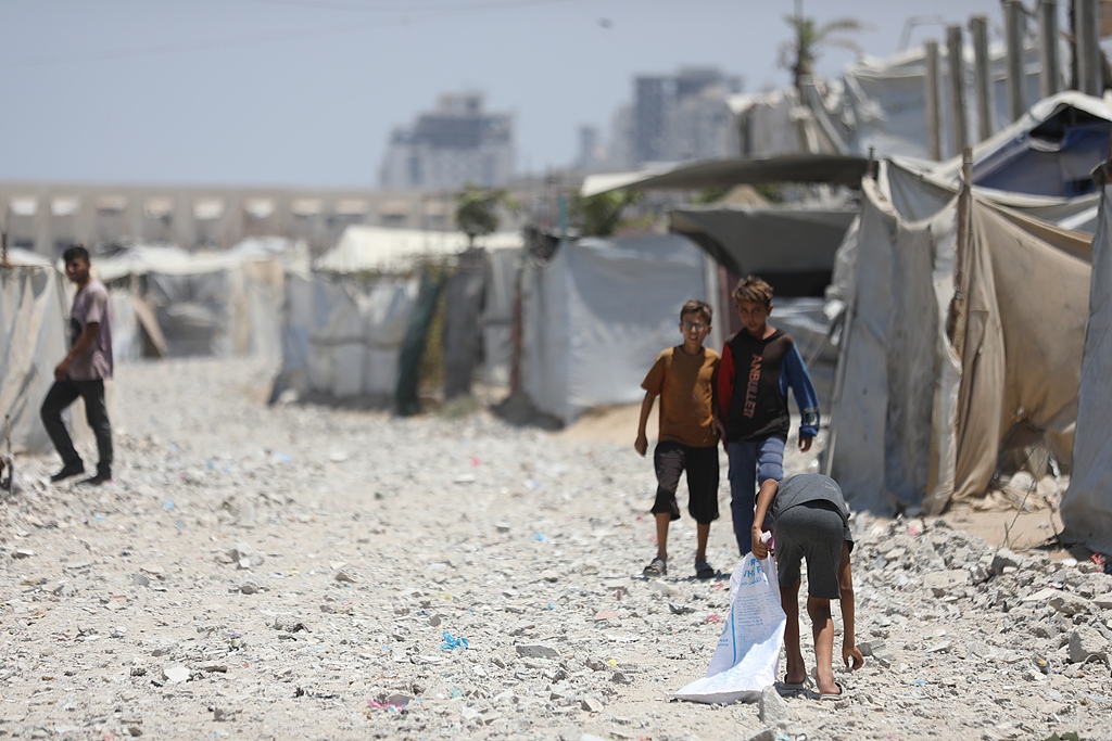 Displaced Palestinians live in tightly packed temporary tents along the beach in Gaza City, Gaza Strip, after fleeing different areas of the enclave, July 9, 2026. /VCG