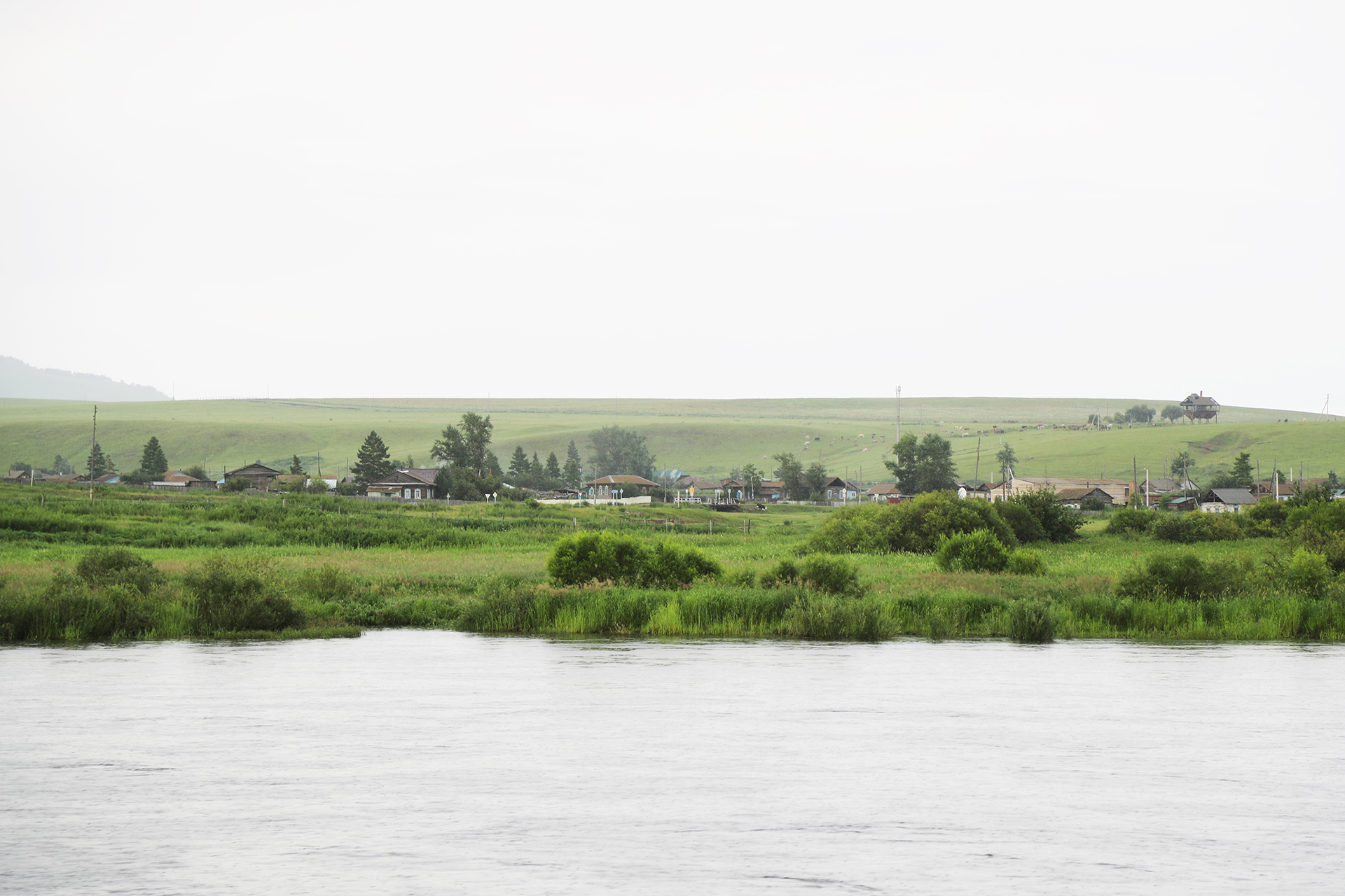 A view of Olochi in Russia from a China-Russia border river cruise on the Ergun River. /CGTN