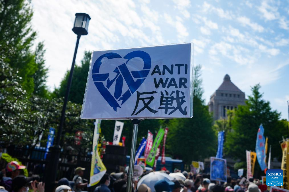 People take part in a protest around Japan's National Diet Building in Tokyo, calling for the protection of the pacifist Constitution, April 19, 2026. /Xinhua