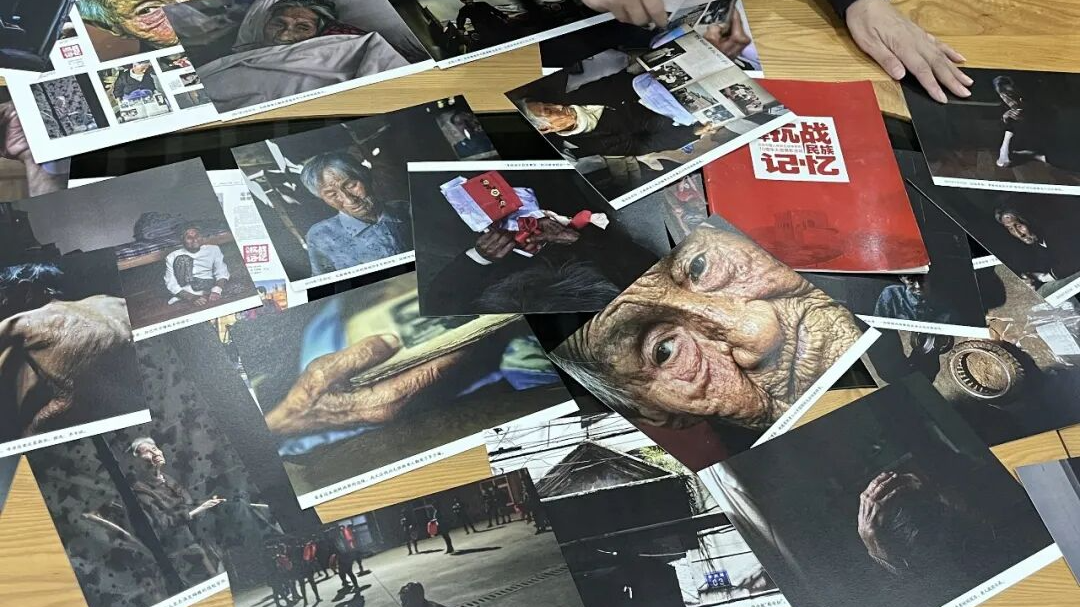 A collection of archival photos documenting survivors of the Japanese military's wartime sexual slavery system is donated to the Memorial Hall of the Victims in Nanjing Massacre by Japanese Invaders in Nanjing, east China's Jiangsu Province, August 14, 2026. /CMG