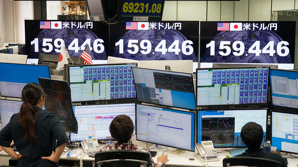 An electronic board displays the Japanese yen's exchange rate against the US dollar in Minato Ward, Tokyo, Japan, August 14, 2026. /VCG