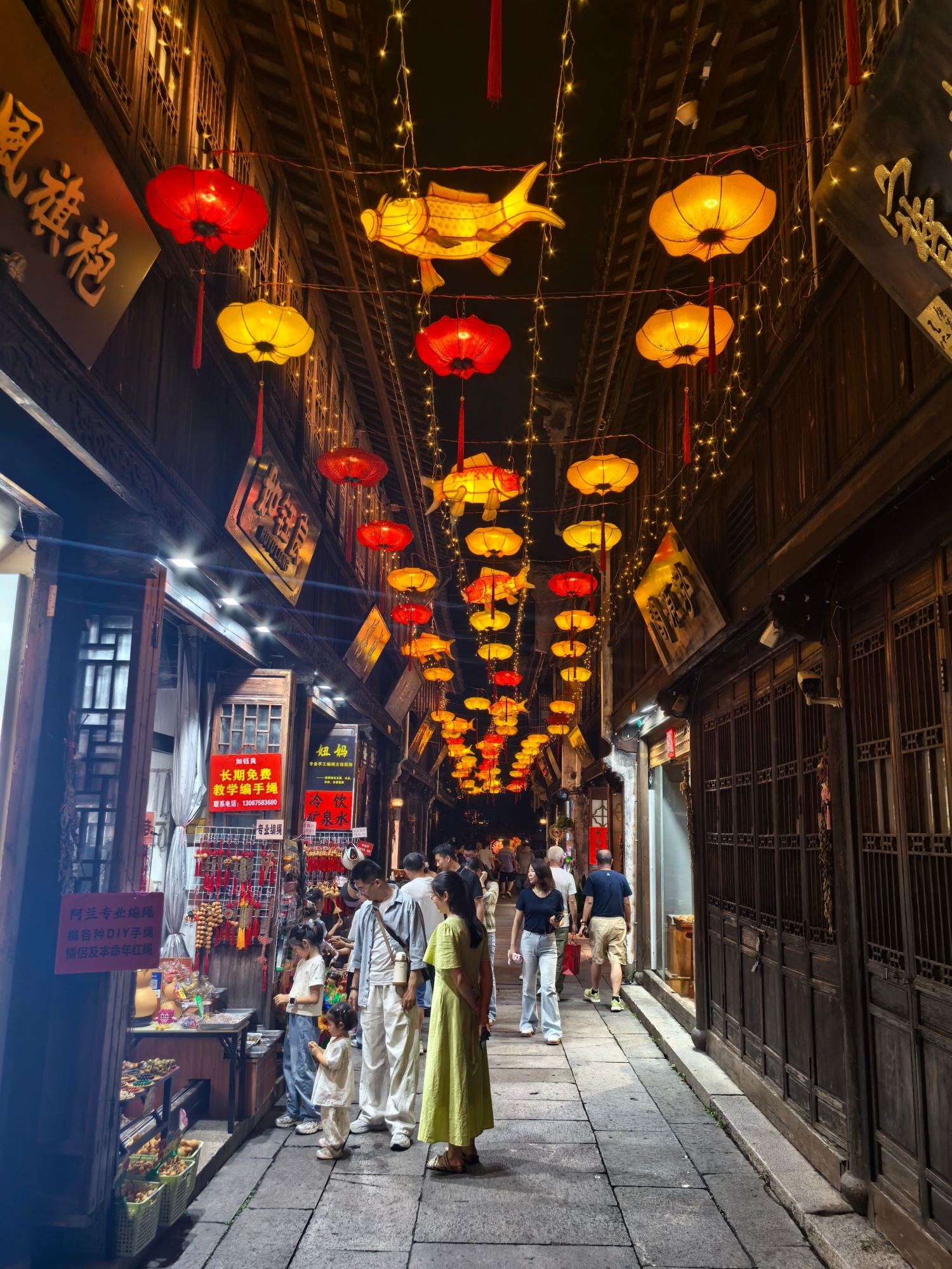 People visit Yuehe Ancient Street in Jiaxing, east China's Zhejiang Province on June 25, 2026. /CGTN