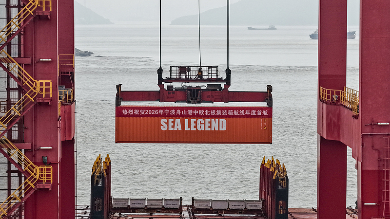 The Dubai Tower container ship loads containers at Ningbo-Zhoushan Port in east China's Zhejiang Province, marking the start of weekly summer operations on the China-Europe Arctic Express route, August 15, 2026. /VCG
