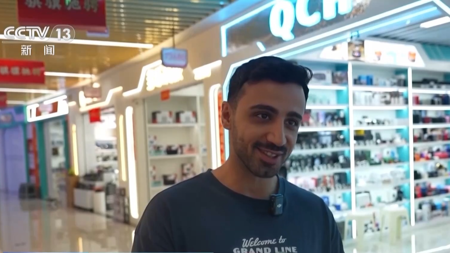 Syrian tourist Saed speaks with China Media Group after trying out high-tech products in Yiwu, Jinhua City, east China's Zhejiang Province. /CMG