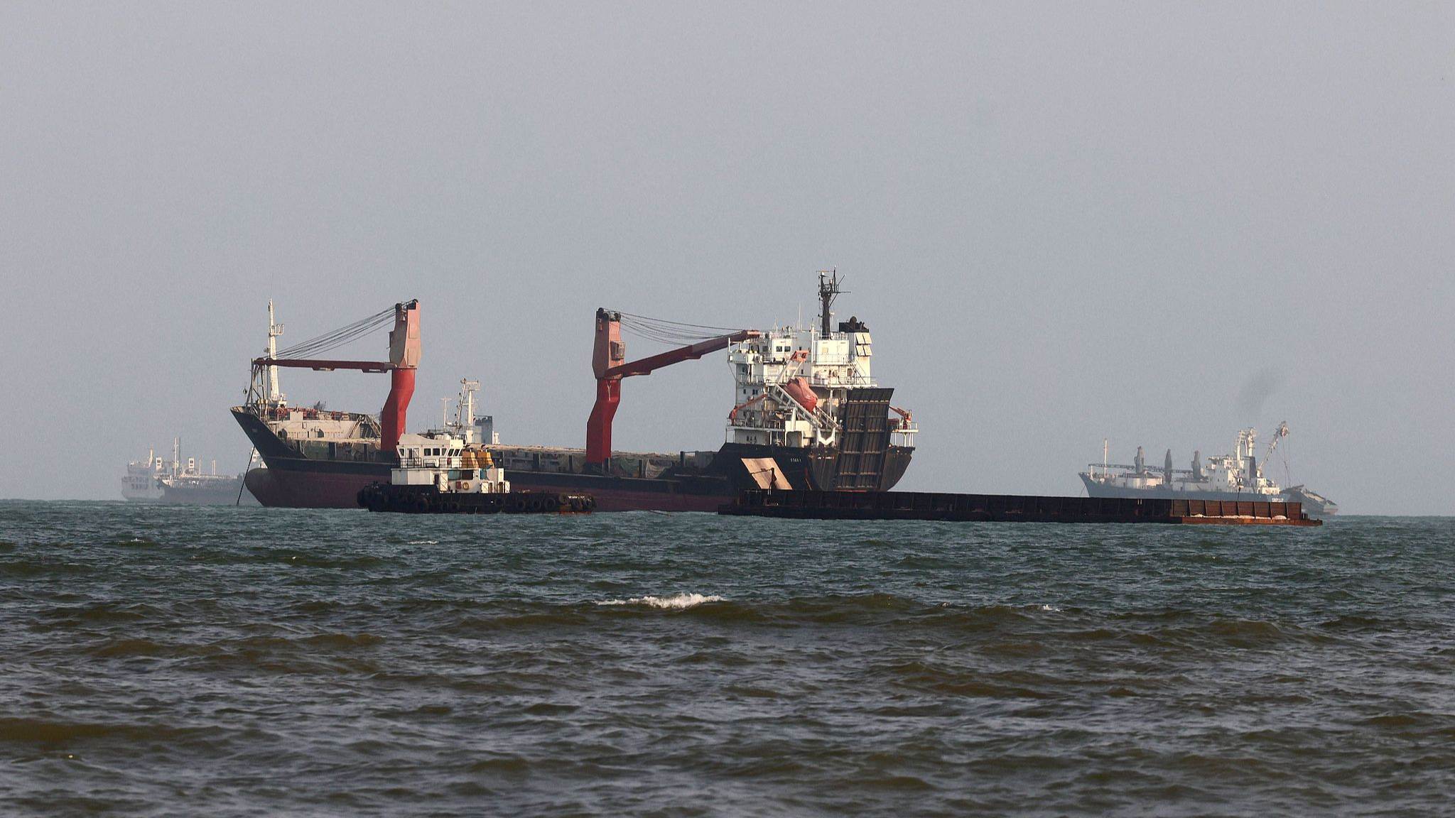 Vessels are seen in the Strait of Hormuz, off the port city of Bandar Abbas in southern Iran on August 10, 2026. /VCG