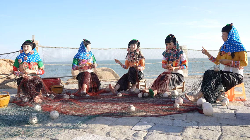 Hui'an women mend fishing nets, Fujian Province, China, August 18, 2026. Yu Bokun /CGTN