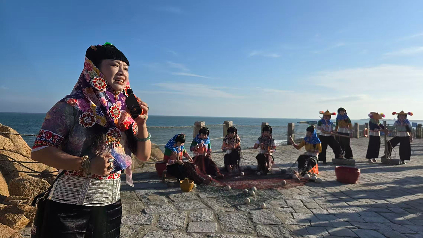 Hui'an women by the seaside, Fujian Province, China, August 18 2026. Guan Xin /CGTN