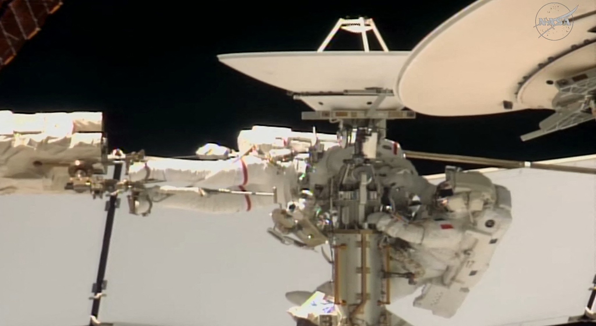 NASA, ESA astronauts conduct spacewalk to replace ISS antenna