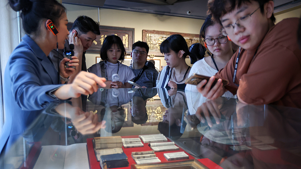 Young people from China's Taiwan visit the Xuzhou Imperial Edict Museum in Xuzhou City, east China's Jiangsu Province, August 17, 2026. /VCG