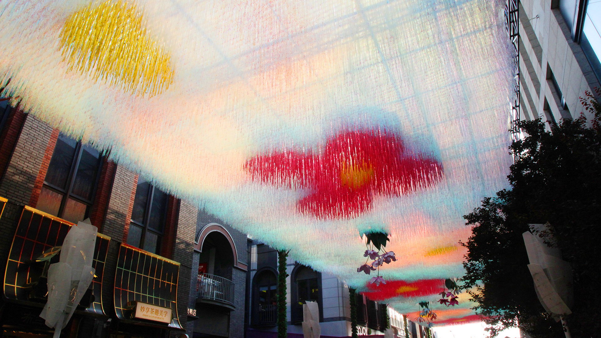 Inverted garden canopy adds romance to historic Beijing alley