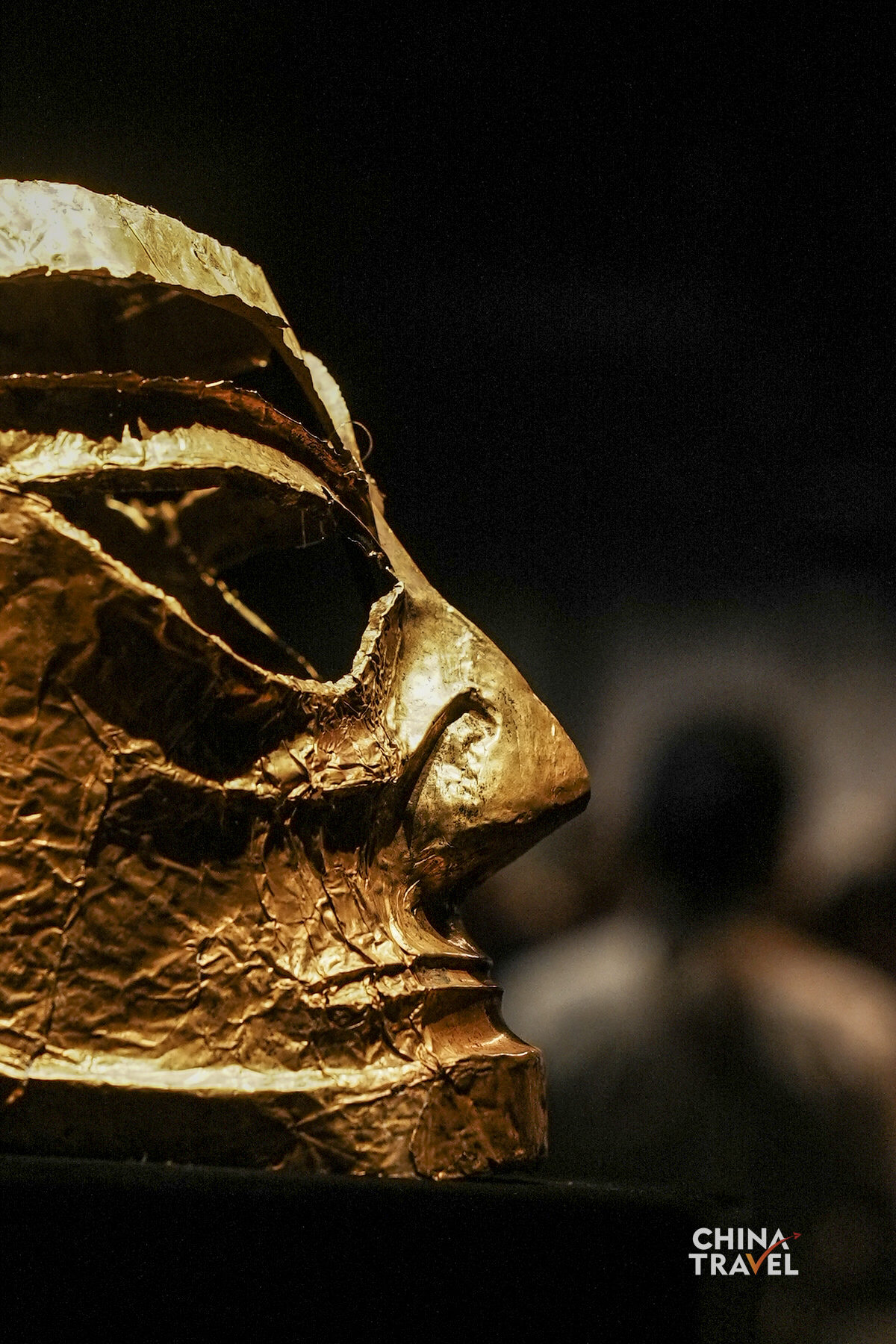 This is a gold mask unearthed at Sanxingdui, an archeological museum in Sichuan Province. Made from thin gold sheets, such masks may once have been attached to bronze heads or wooden figures. /CGTN