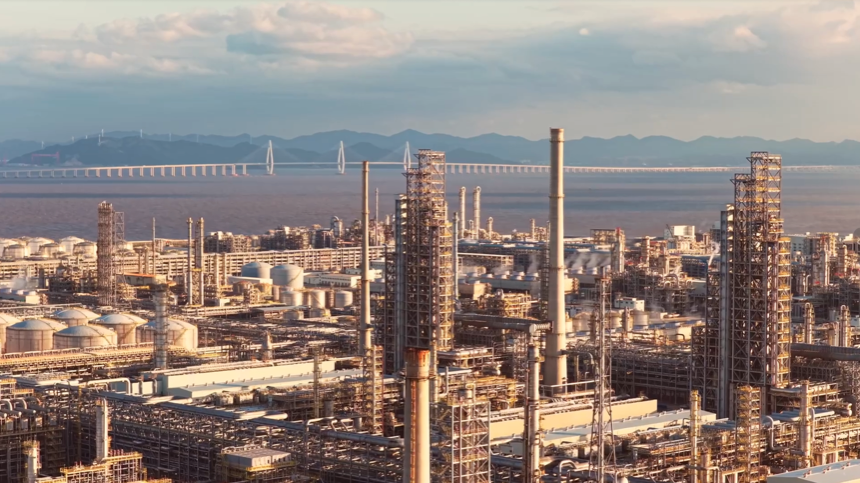 The Zhoudai Bridge in the background, with a local industrial facility in the foreground. /CGTN