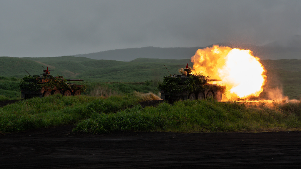 A Japan Ground Self-Defense Force maneuver combat vehicle fires ammunition during a live-fire exercise at the East Fuji Maneuver Area in Gotemba, Shizuoka Prefecture, Japan, June 7, 2026. /VCG 