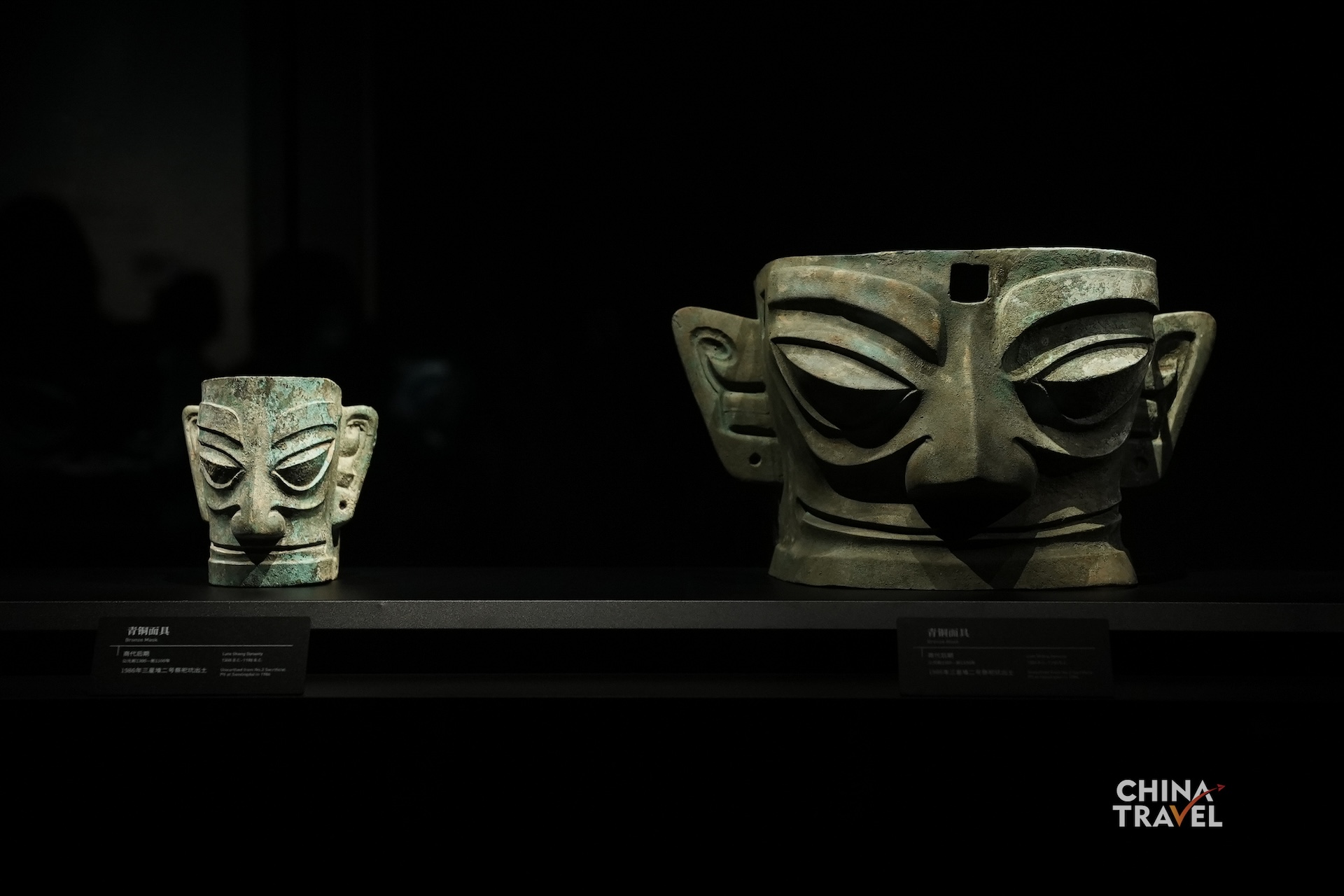 Two bronze masks from Sanxingdui feature protruding eyes, large ears and exaggerated facial features characteristic of the ancient Shu civilization, which dates back to some 5,000 to 3,000 years ago. /CGTN