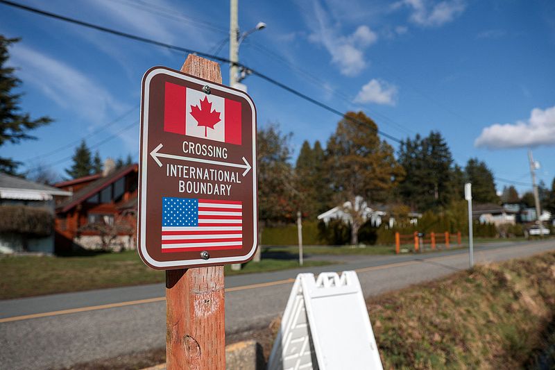 A sign marking the international border between the United States and Canada is pictured at Peace Arch Historical State Park in Blaine, Washington State, US, March 5, 2025. /VCG