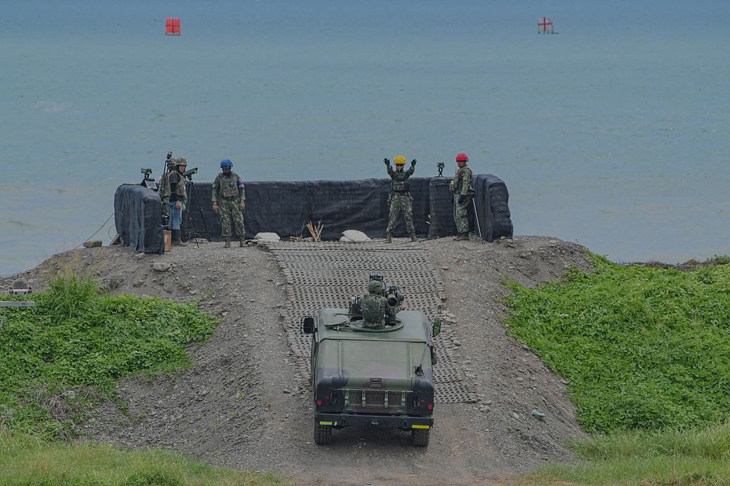 A soldier drives a vehicle equipped with US-made missiles in Pingtung County, southeast China's Taiwan region, July 3, 2023. /VCG